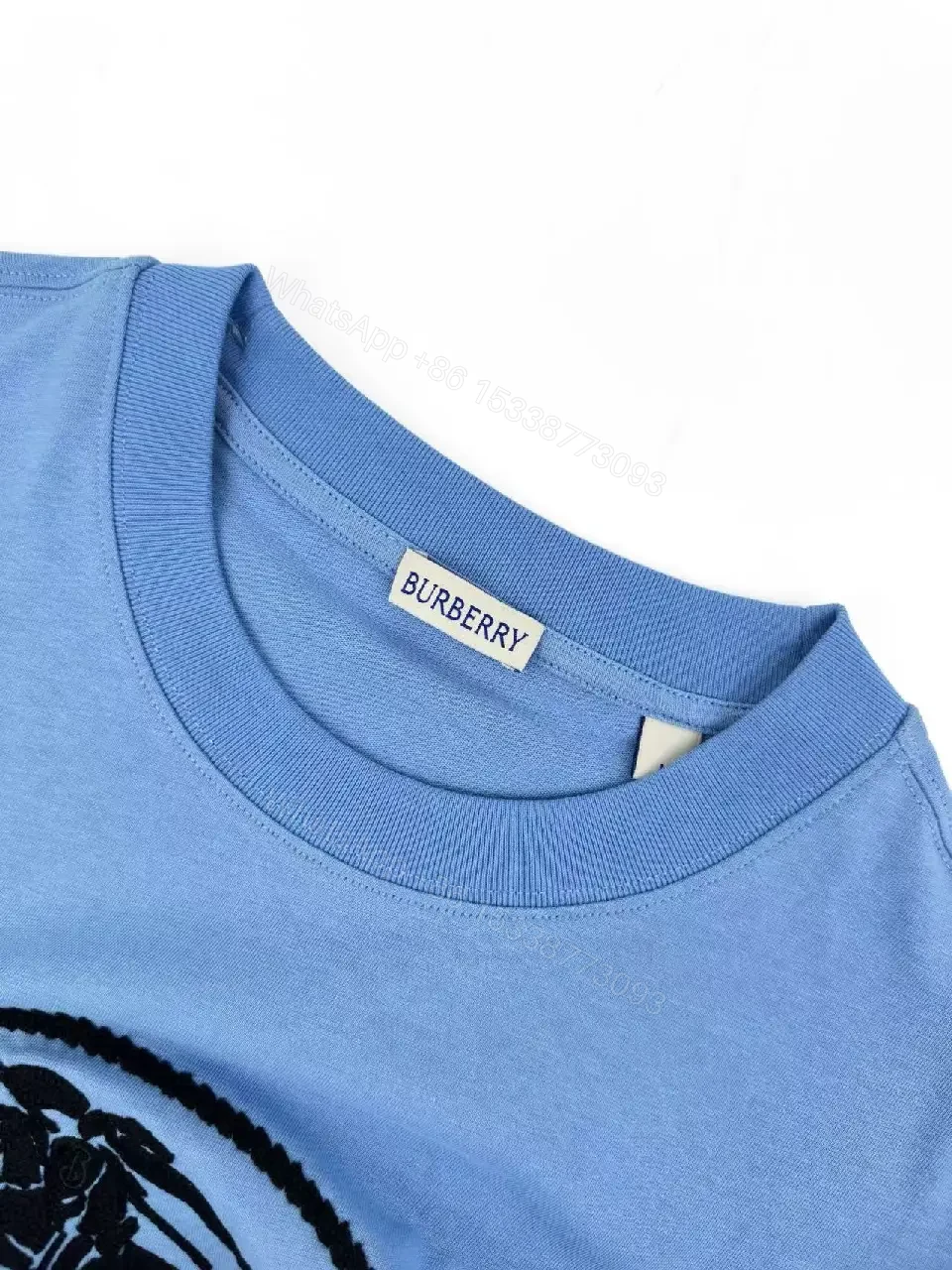 View 8 of Light Blue Short-Sleeve Crew Neck Tee with Black Horse Logo