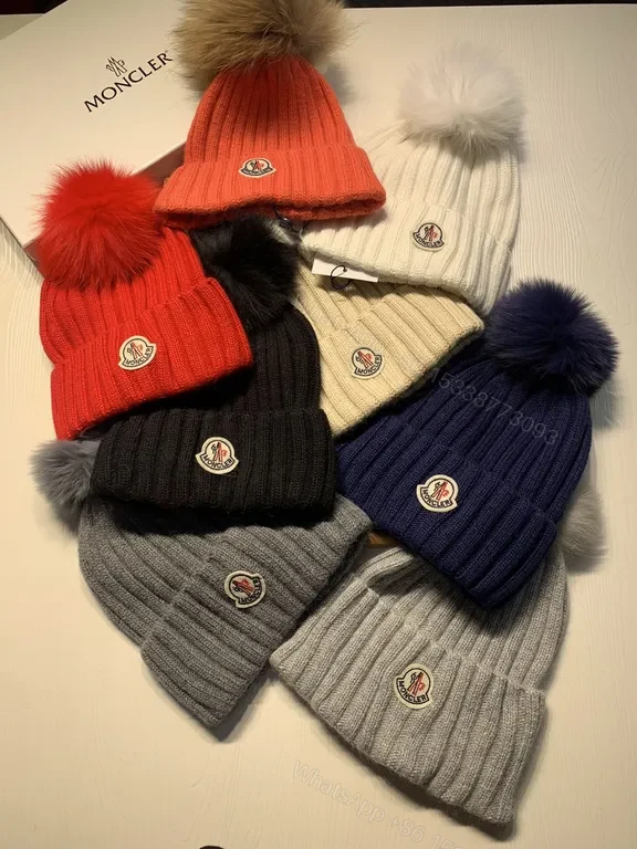 View 5 of Moncler Wool-Blend Beanie with Faux-Fur Pom, Black, Luxury Style
