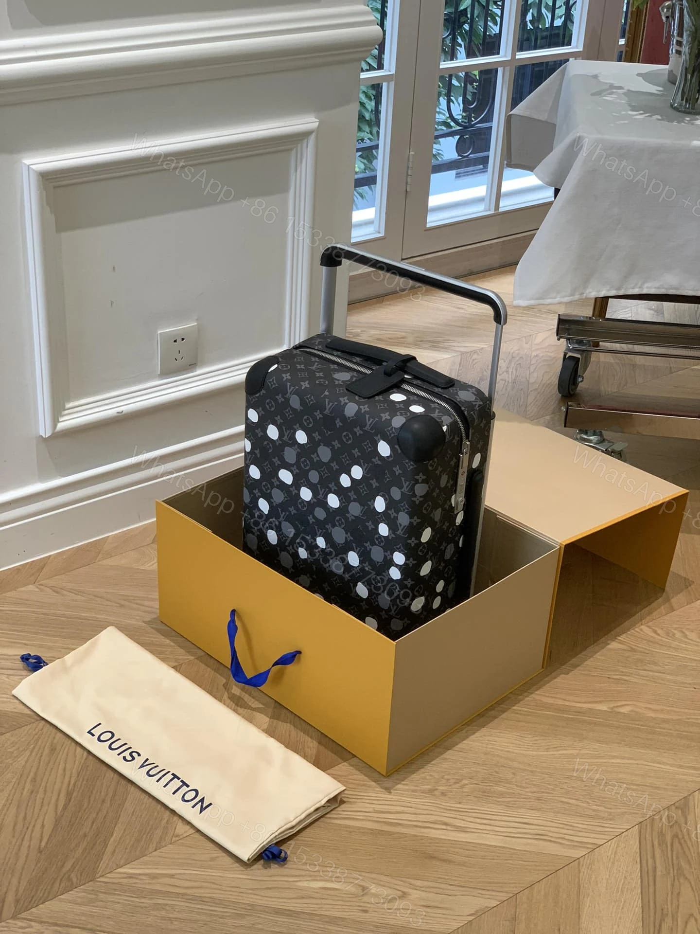 View 4 of Louis Vuitton X Yayoi Kusama Horizon 55 Suitcase Grained Leather Black 55Cm