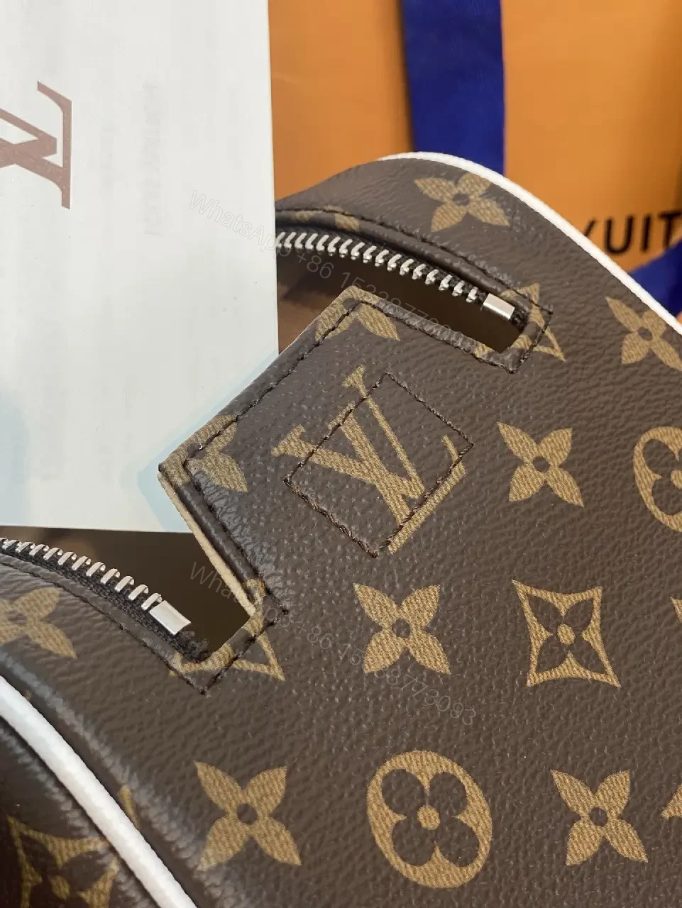 View 9 of Blue Leather Trim Toiletry Bag: Monogram Canvas, LV Zippers, Adjustable Strap
