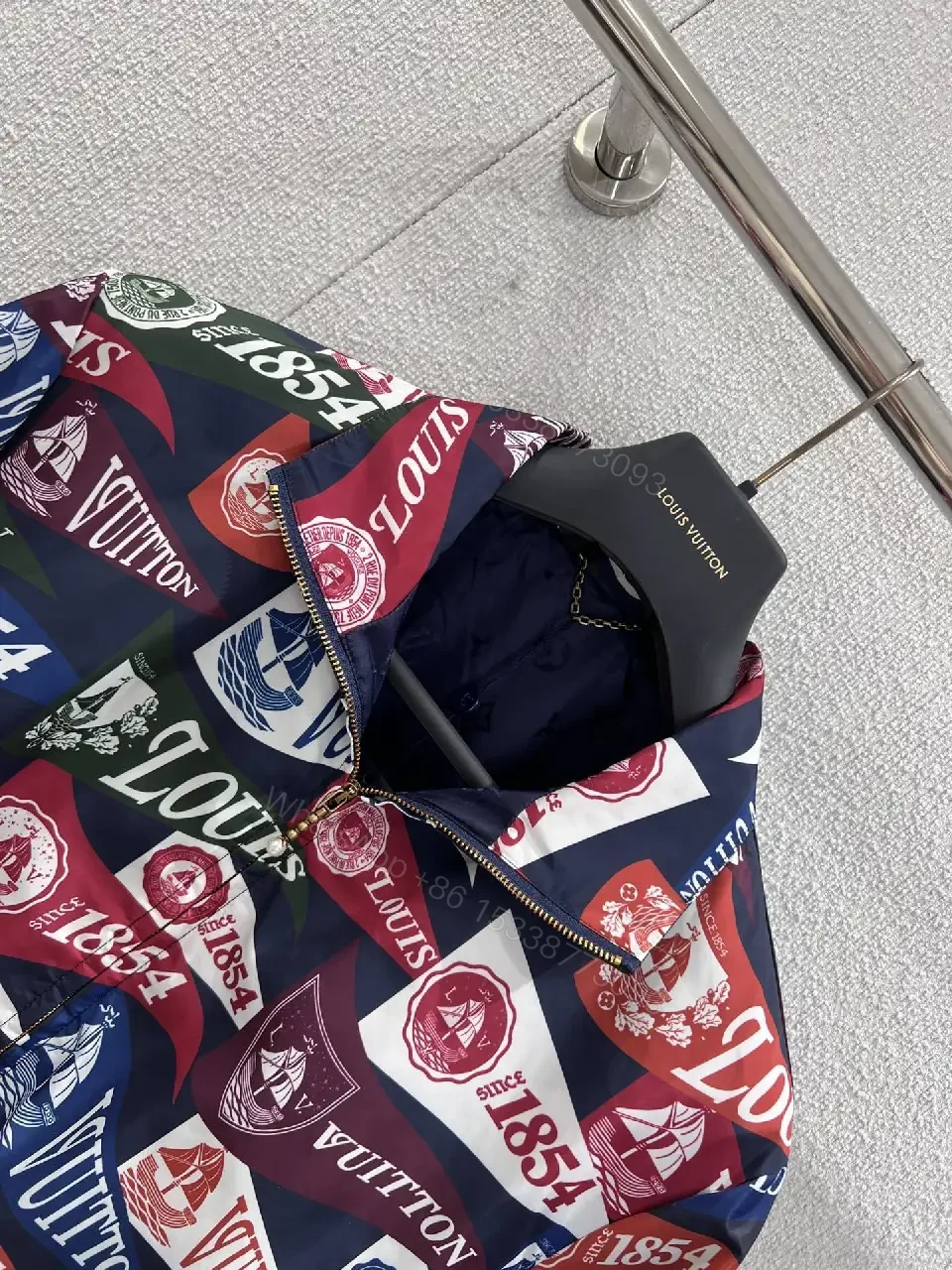 View 10 of Bold Patterned Zip Jacket: Logo Motif Luxury Streetwear