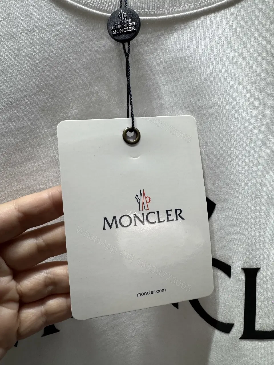 View 9 of White Cotton Crest Tee: Modern Luxury, Relaxed Fit
