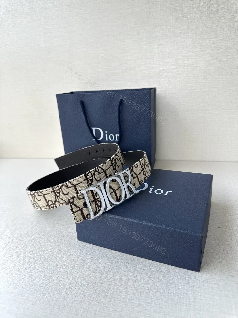 View 7 of Monogram Canvas Belt with Gold Logo Buckle, Black Interior