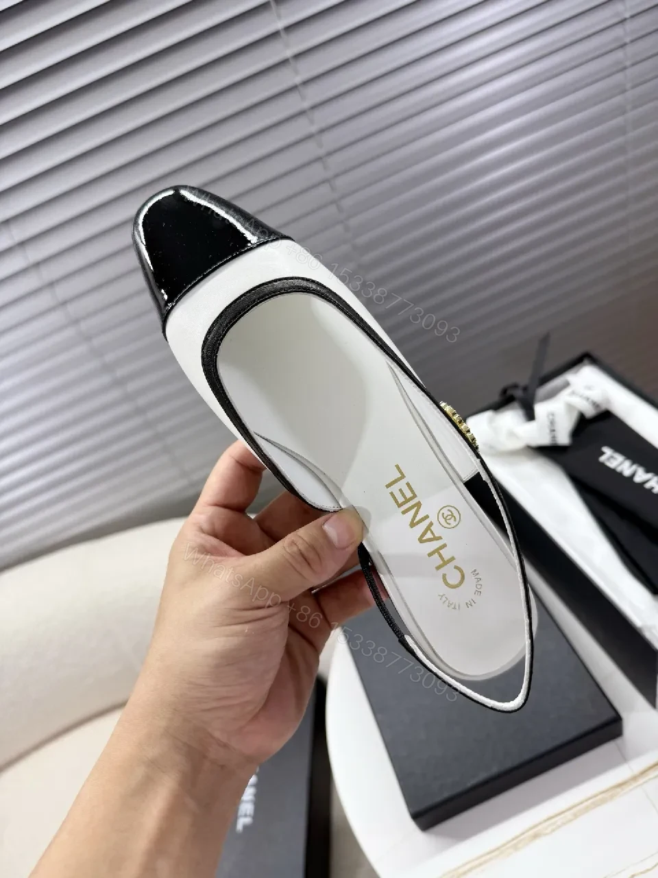 View 2 of Two-Tone Patent Slingback Pumps: Sharp Architectural Elegance