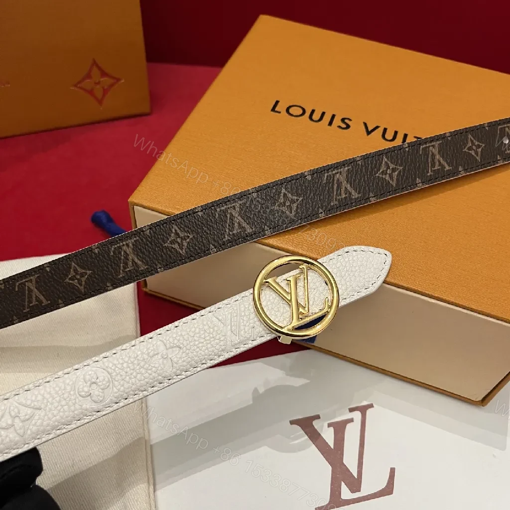 View 2 of Minimalist Black Pebbled Leather Belt with Gold Emblem