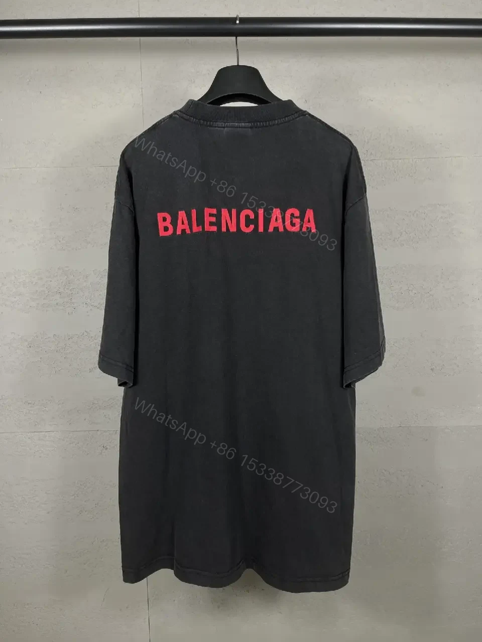 View 5 of Oversized Black Tee Dress with Subtle Red Logo, Modern Couture Edge