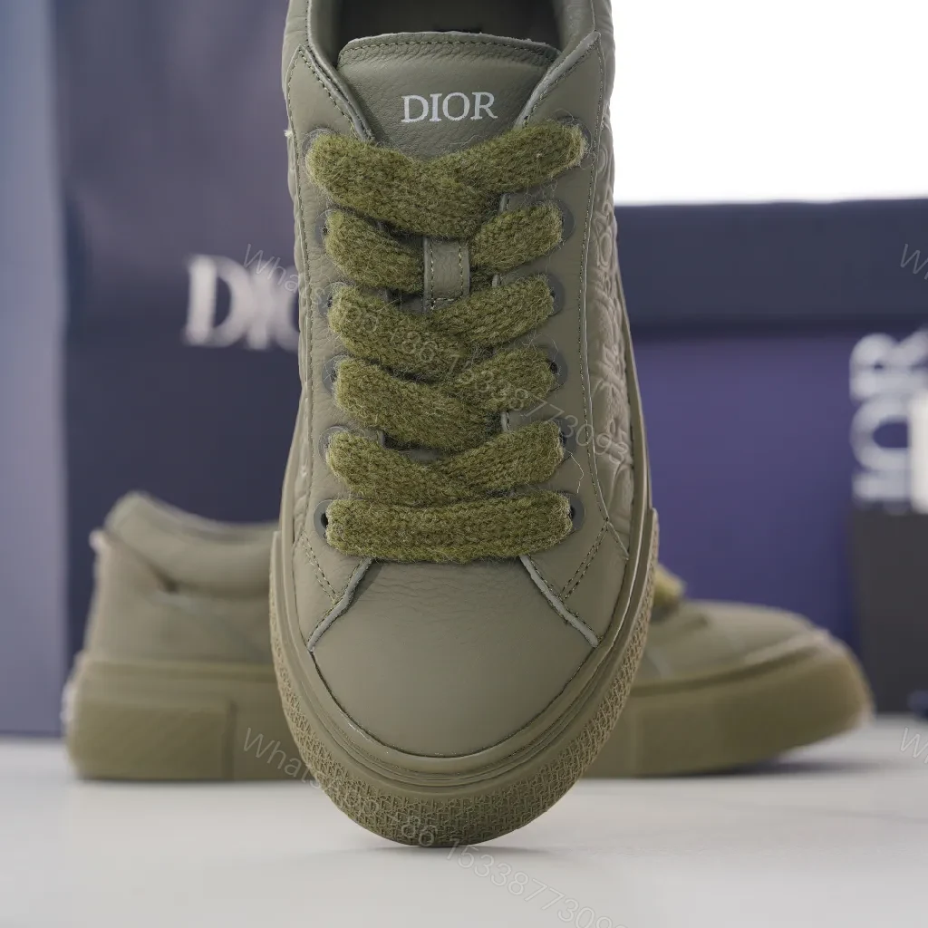 View 5 of Olive Luxe Olive Suede-Leather High-Top Sneaker with Monogram Embossing