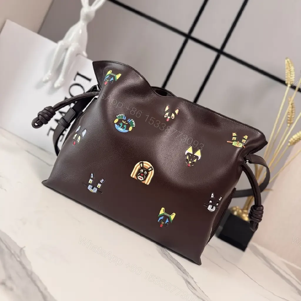 View 8 of Dark Leather Crossbody: Playful Animal Motifs, Compact Chic