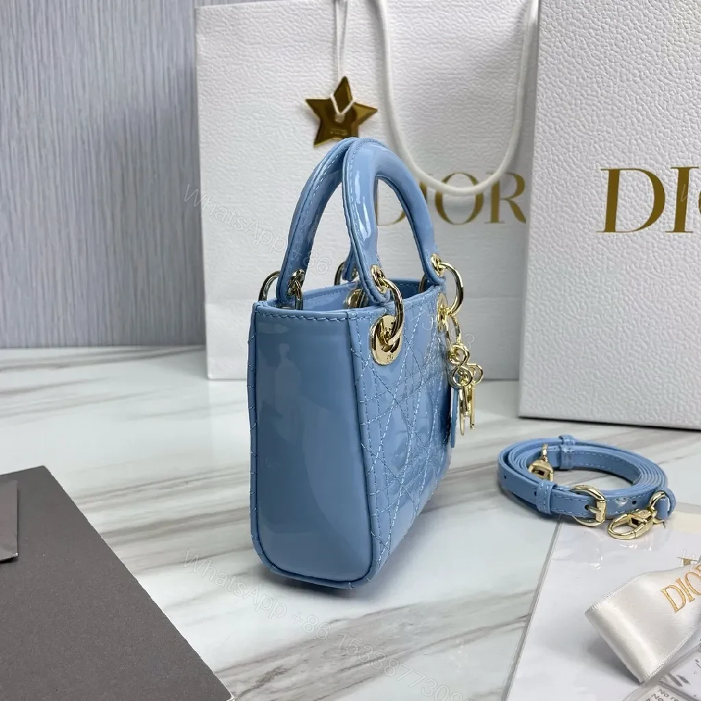 View 9 of Blue Quilted Mini Bag - Calf Leather, Crossbody/Top Handle, Magnetic Closure