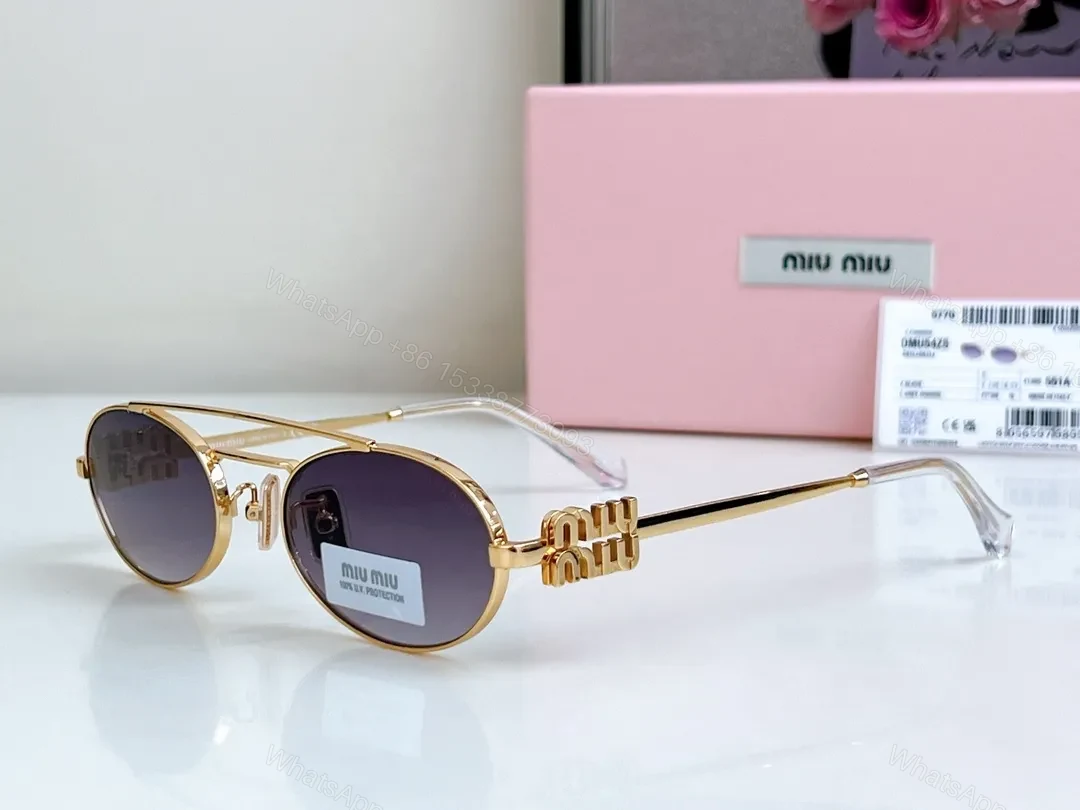 Gold-Tone Round Sunglasses with Signature Hardware - Deluxe Eyewear — view 1