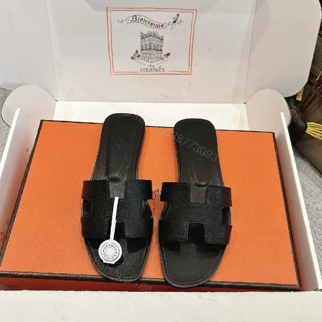 View 4 of Black Leather Minimalist Slides with Signature Cross‐Band