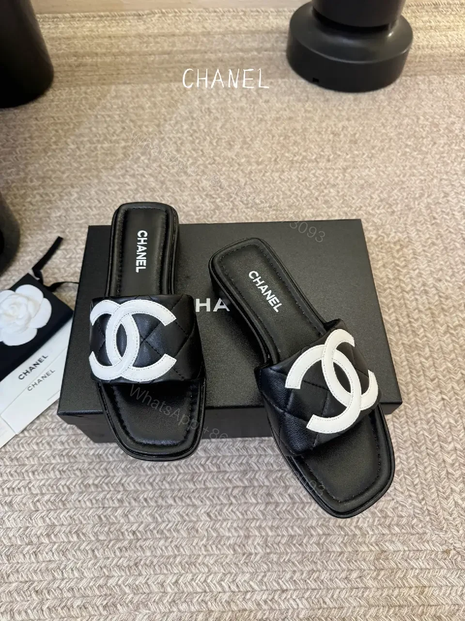 View 4 of Interlocking Logo Slip-Ons: Black & White Luxury Sandals