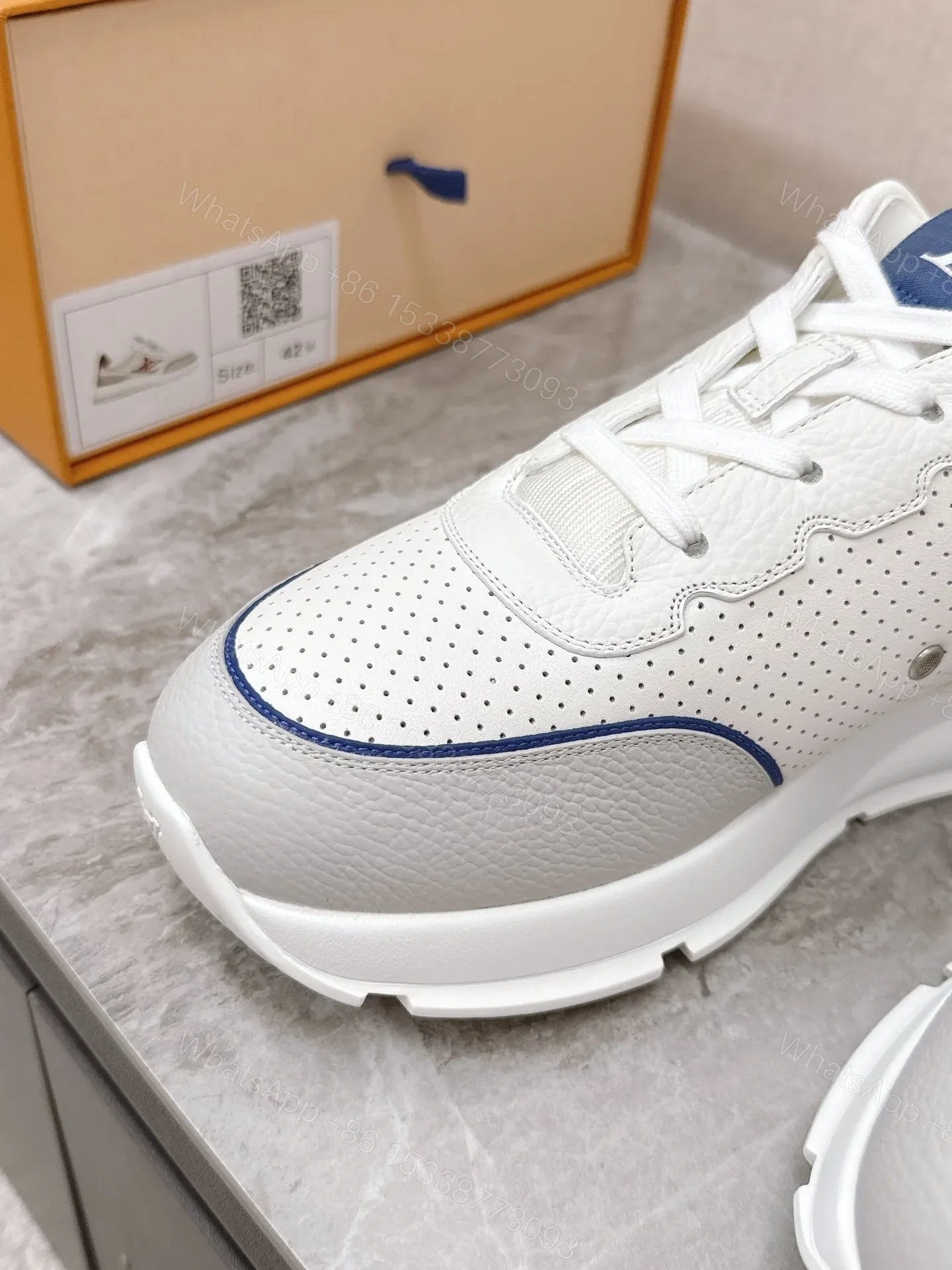 View 2 of LV Women White Leather Sneakers With Blue Accents