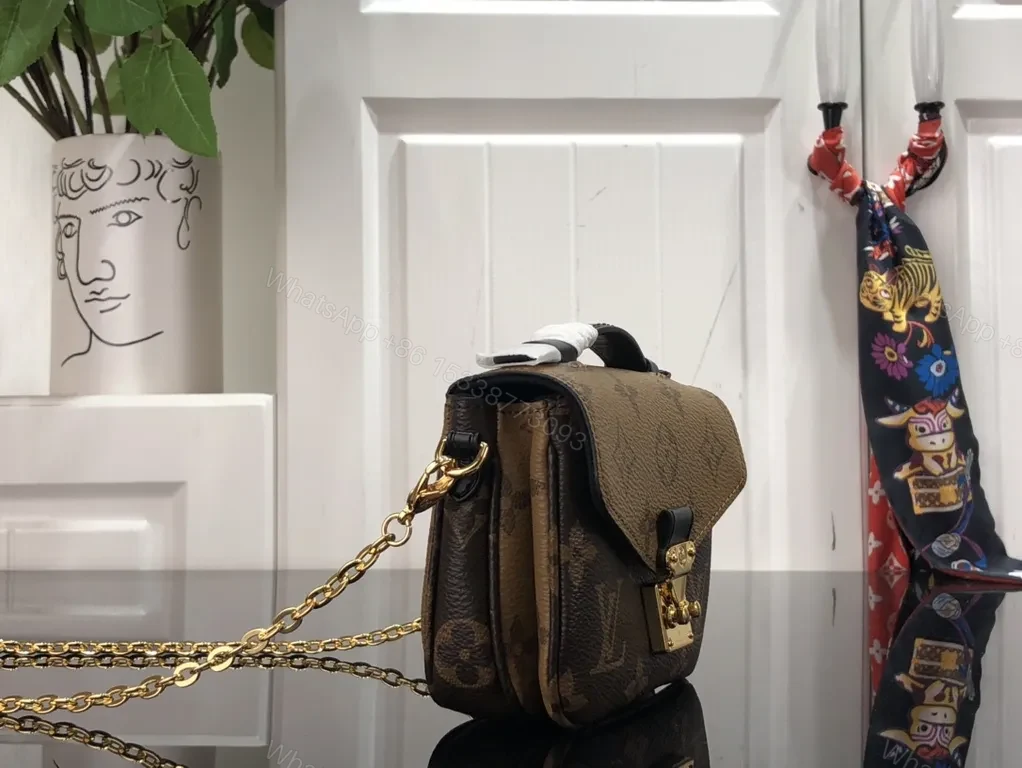 View 5 of Gold-Coated LV Monogram Crossbody Bag - Compact Luxury