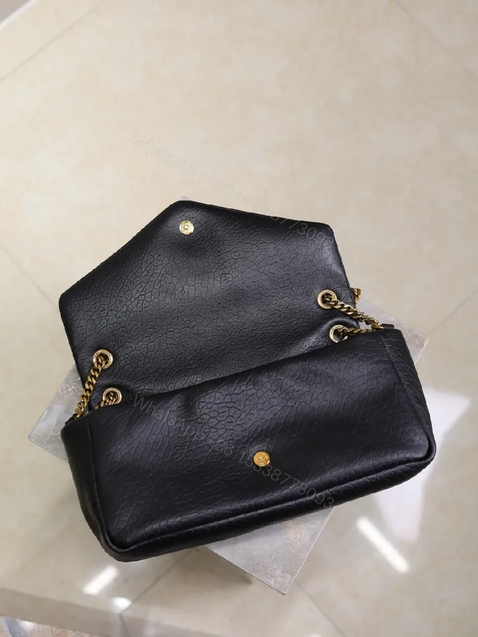 View 6 of Textured Leather Crossbody Clutch with Gold Logo hardware