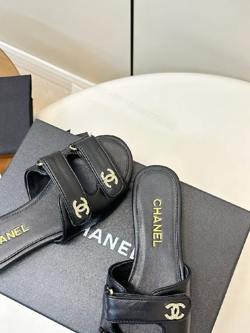 View 7 of Black Leather Slip-On Sandals with Gold Hardware - Sophisticated Everyday Glam