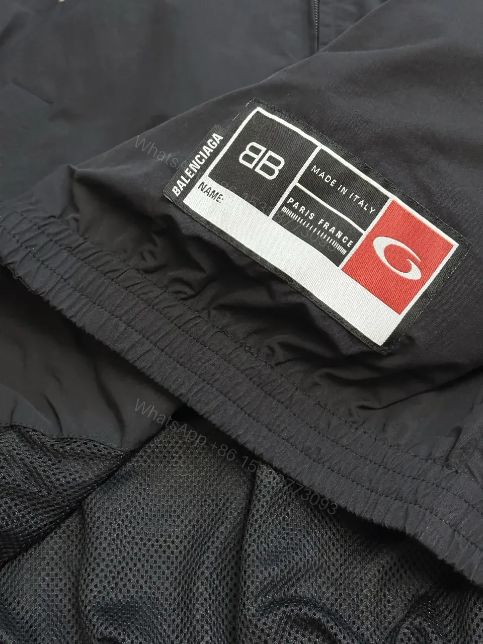 View 5 of Black Nylon Windbreaker Modern Logo-Driven Streetwear Jacket
