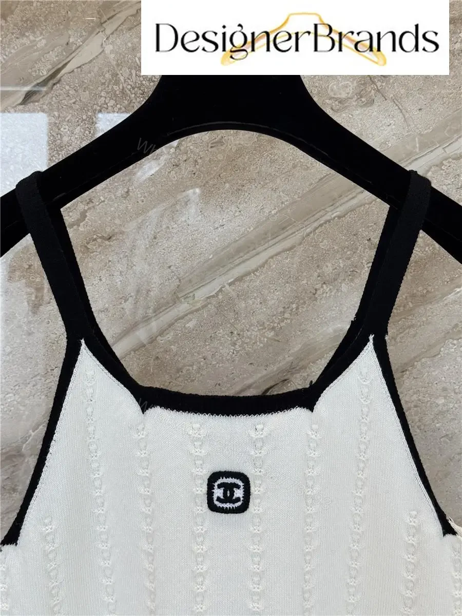 View 8 of White Knit Tank: Black Trim, Vertical Rib, Sleek Silhouette, Sleeveless Top