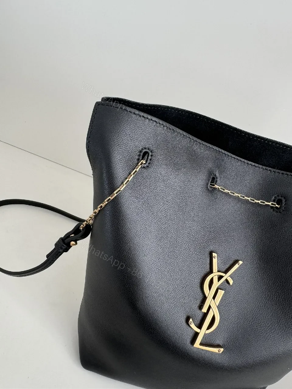 View 8 of Chic Black Leather Bucket Bag with Gold Logo