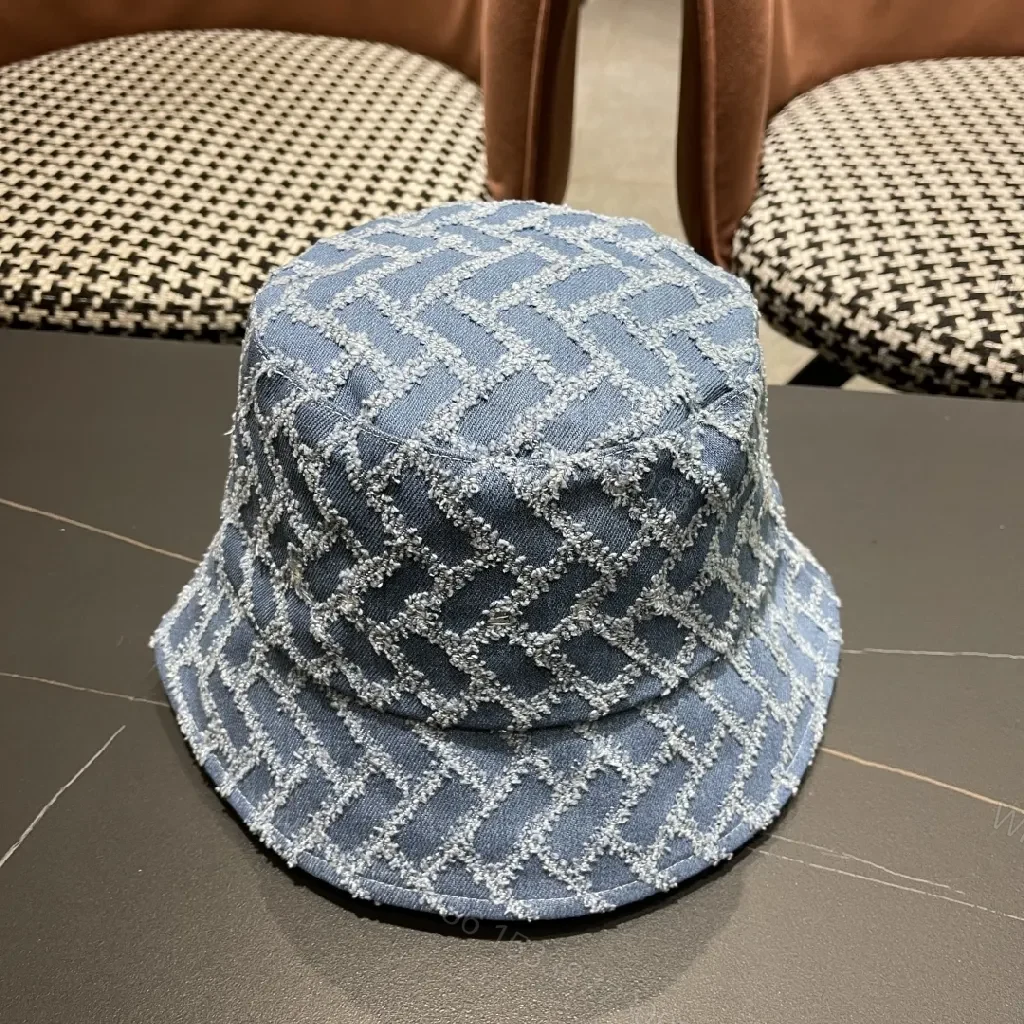 View 9 of Textured Denim Bucket Hat with LV Emblem
