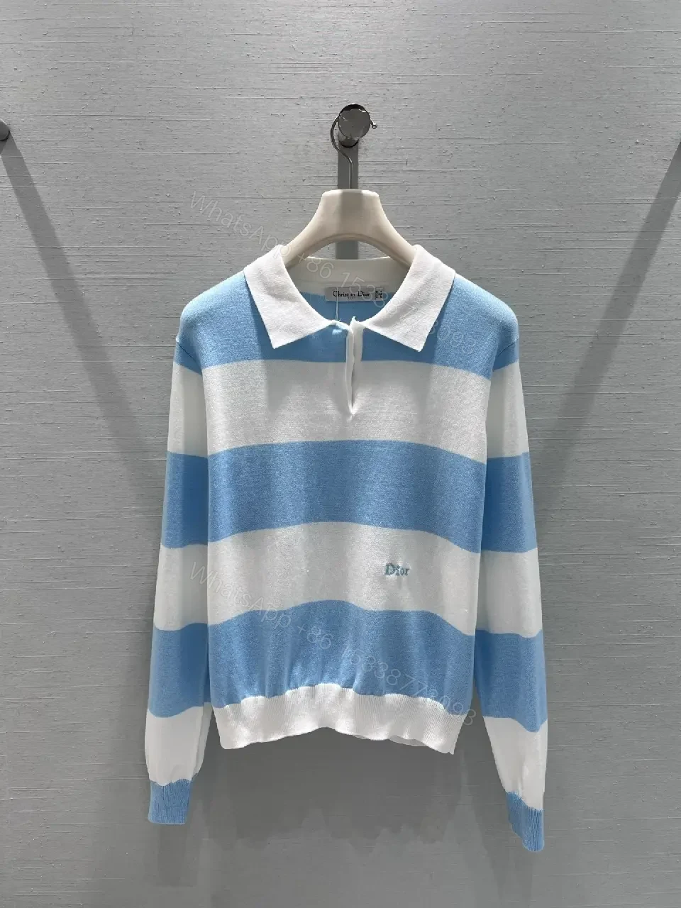 Blue & White Striped Polo Knit with Signature Charm — view 1