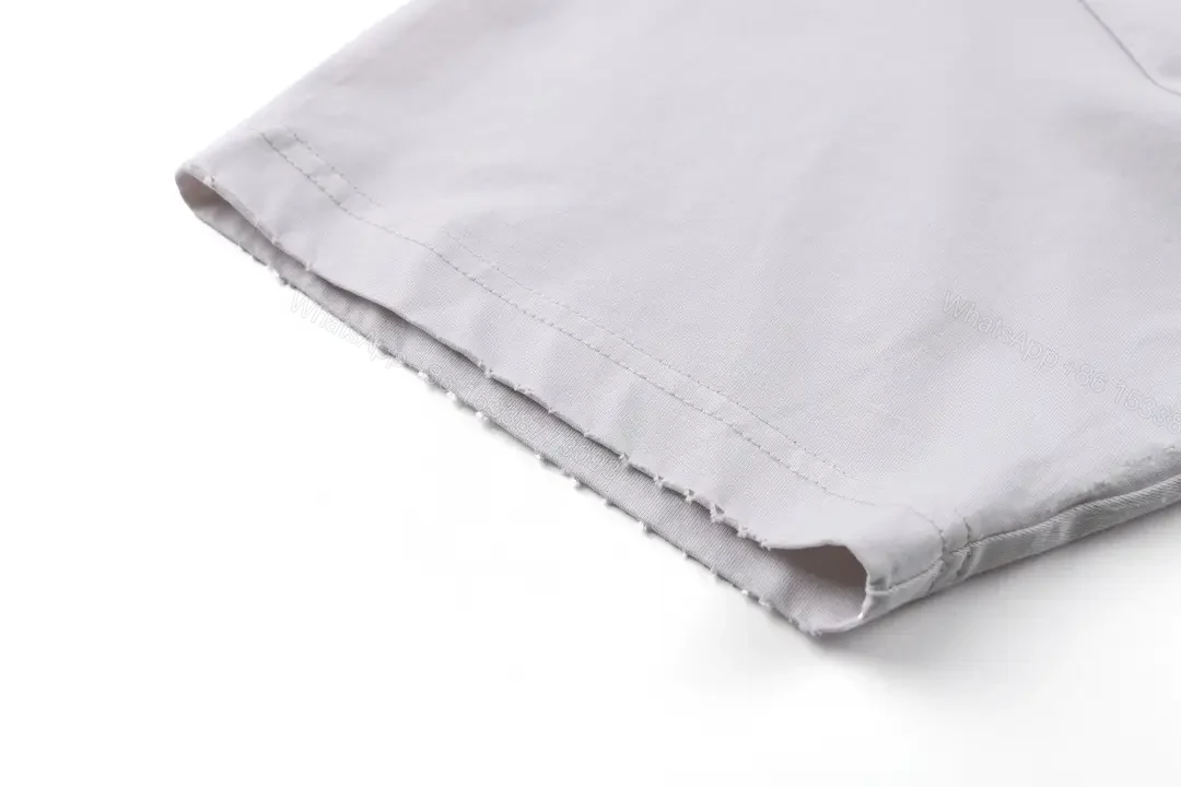 View 2 of Minimal White Cotton Tee: Subtle Logo, All-Day Comfort
