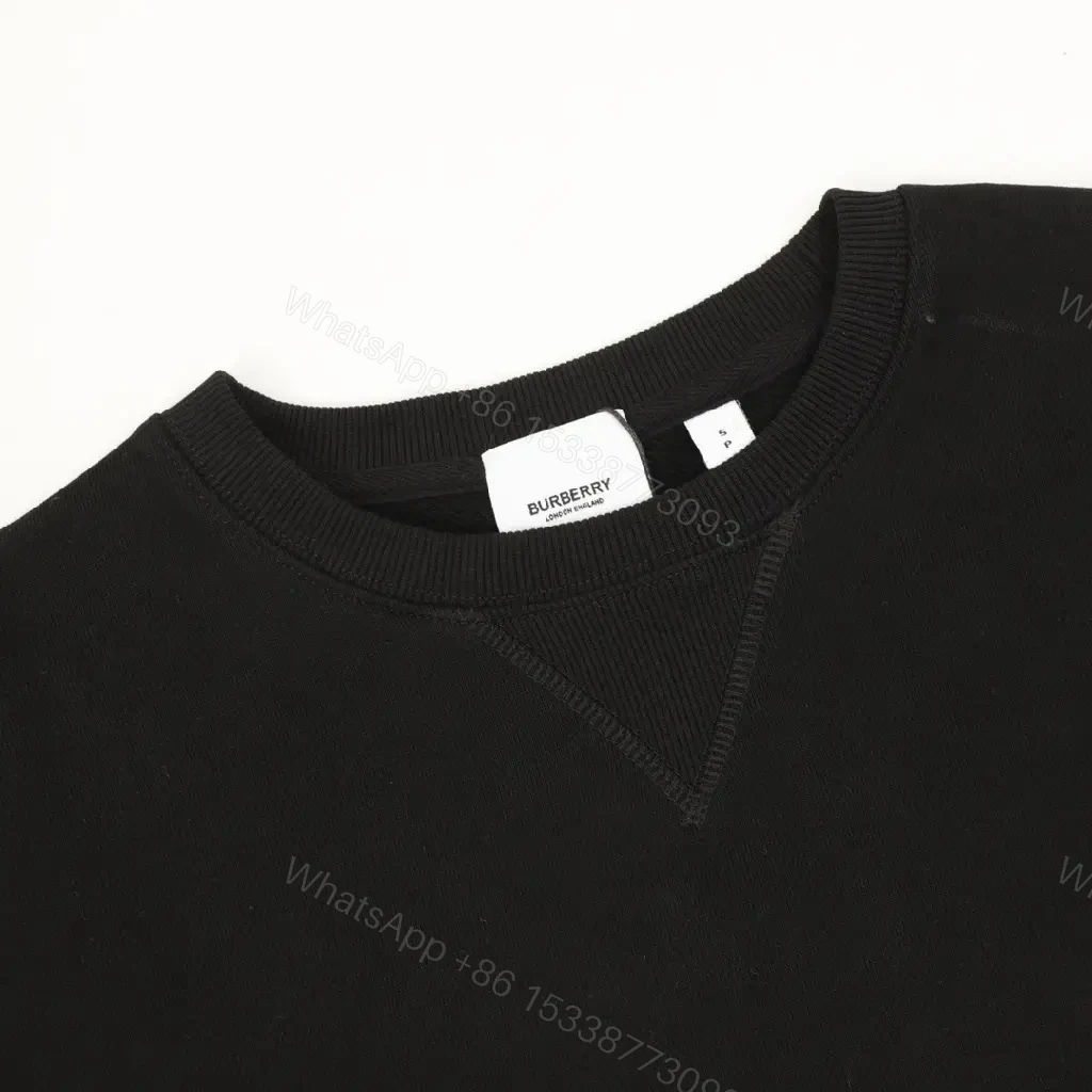 View 2 of Black Knit Crewneck with Signature Check Sleeves, Slim Fit, Luxury Casual