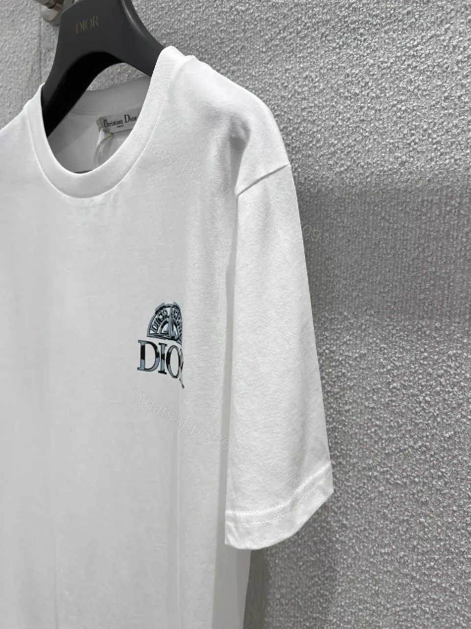 View 8 of Minimalist White Cotton Tee with Crest – Everyday Luxe T‐Shirt