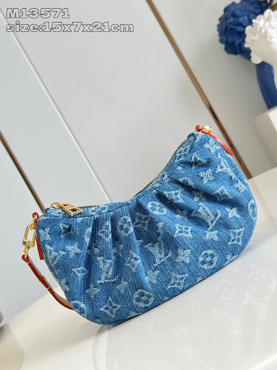 Denim Monogram Crescent Bag: Modern, Durable, Luxury Accessory — view 1