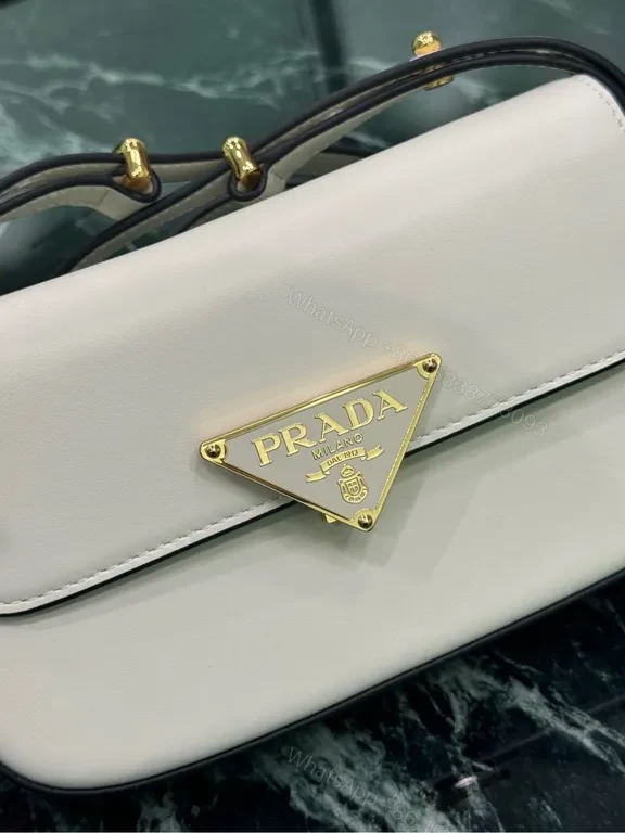 View 2 of Elegant Leather Crossbody Bag: Prada Triangle, Structured Luxury