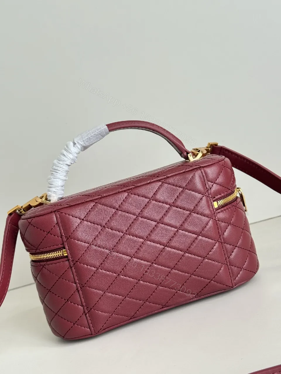 View 2 of Burgundy Quilted Leather Bag with Gold Hardware, Compact Style