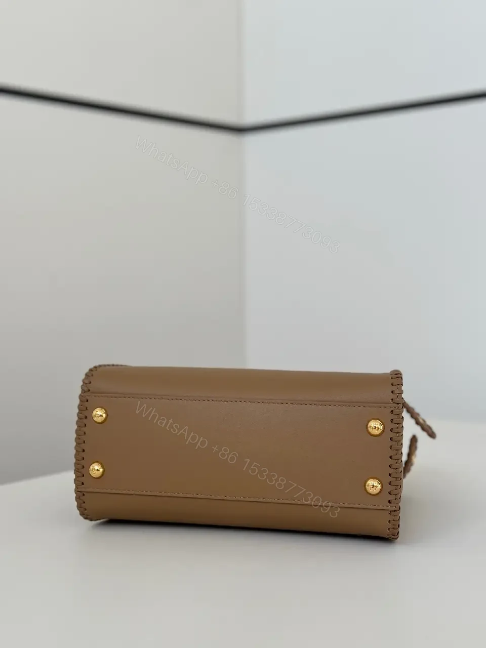 View 7 of Taupe-Tone Leather Crossbody: Braided Edge, Turn-Lock Bag