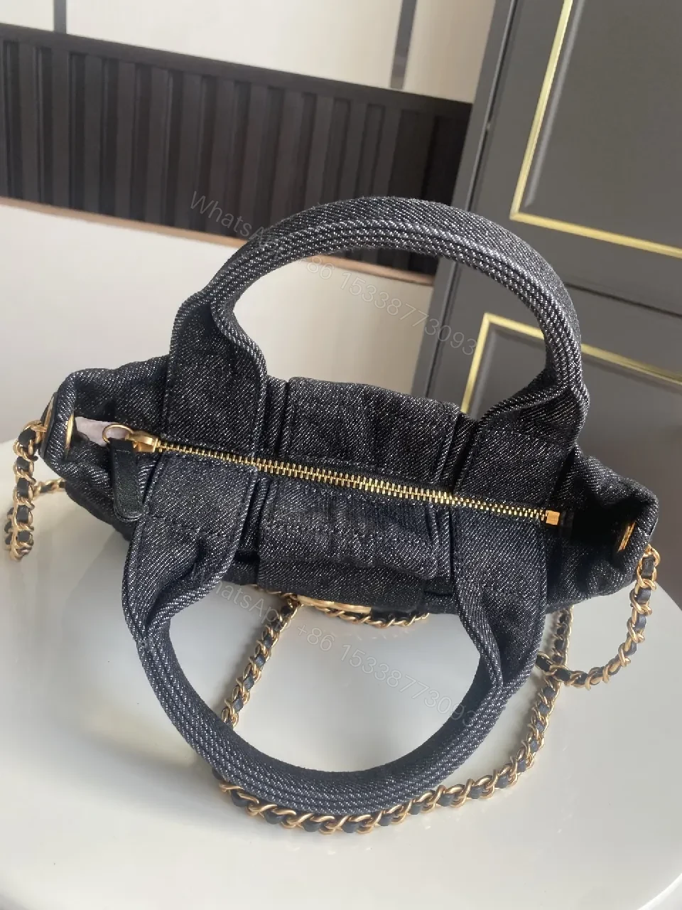 View 9 of Chic Black Denim Mini Bag with Gold Emblem