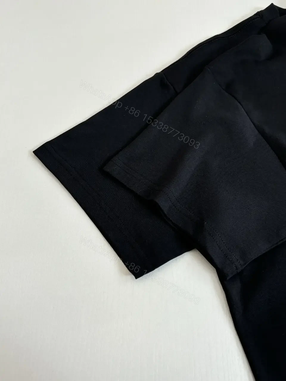 View 4 of Minimalist Black Cotton Tee with Bold No Dior No Dietrich Statement