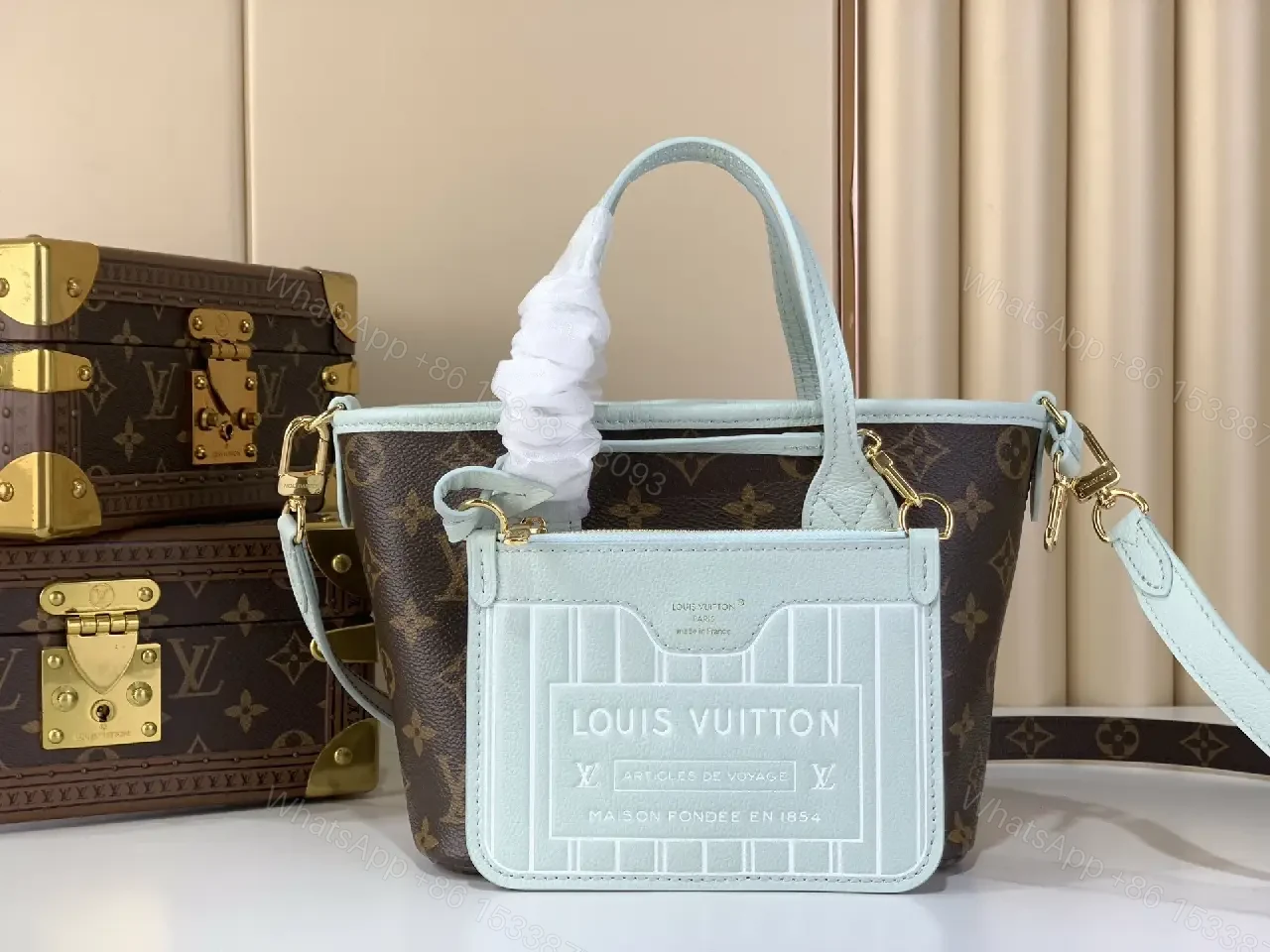View 4 of Powder Blue Leather Trim Monogram Canvas Tote: Structured Luxury
