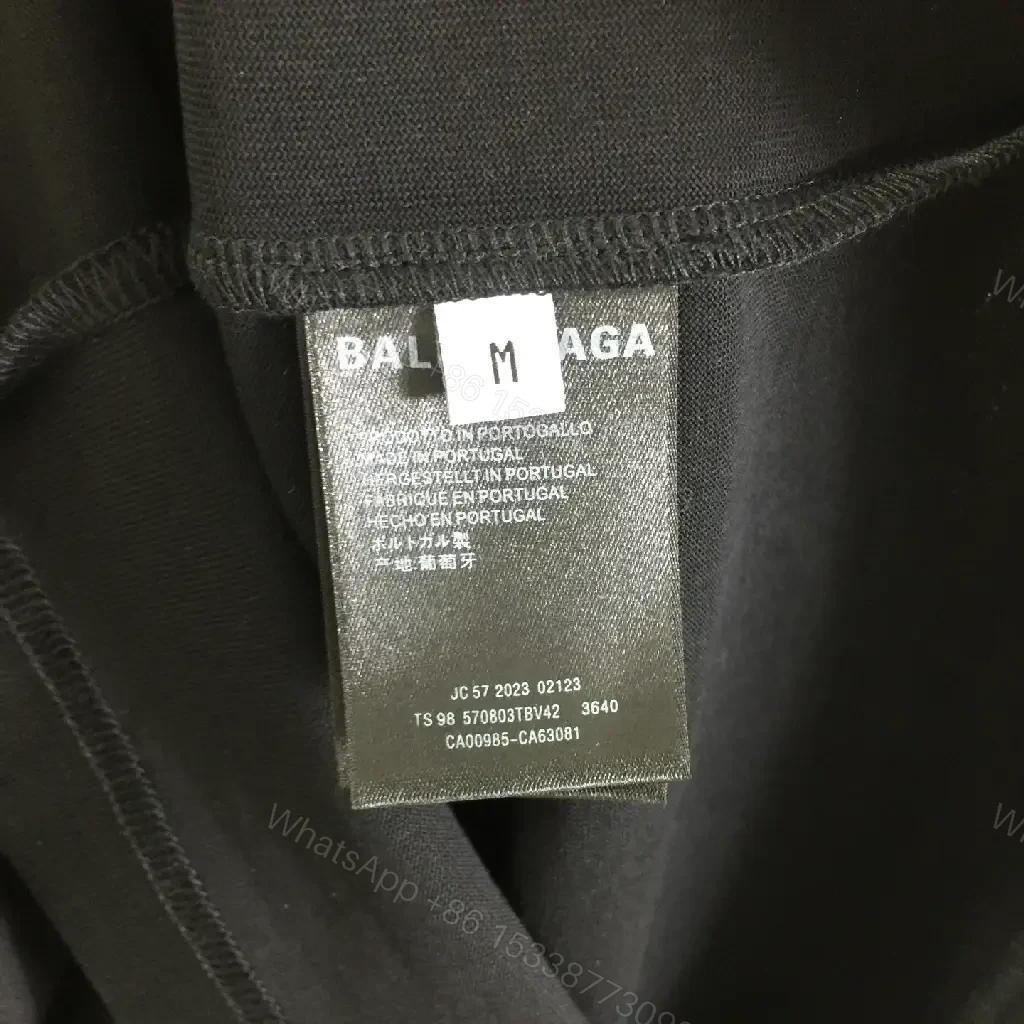 View 8 of Minimalist Black Mockneck Tee: Premium Cotton, Subtle Logo, Versatile Style