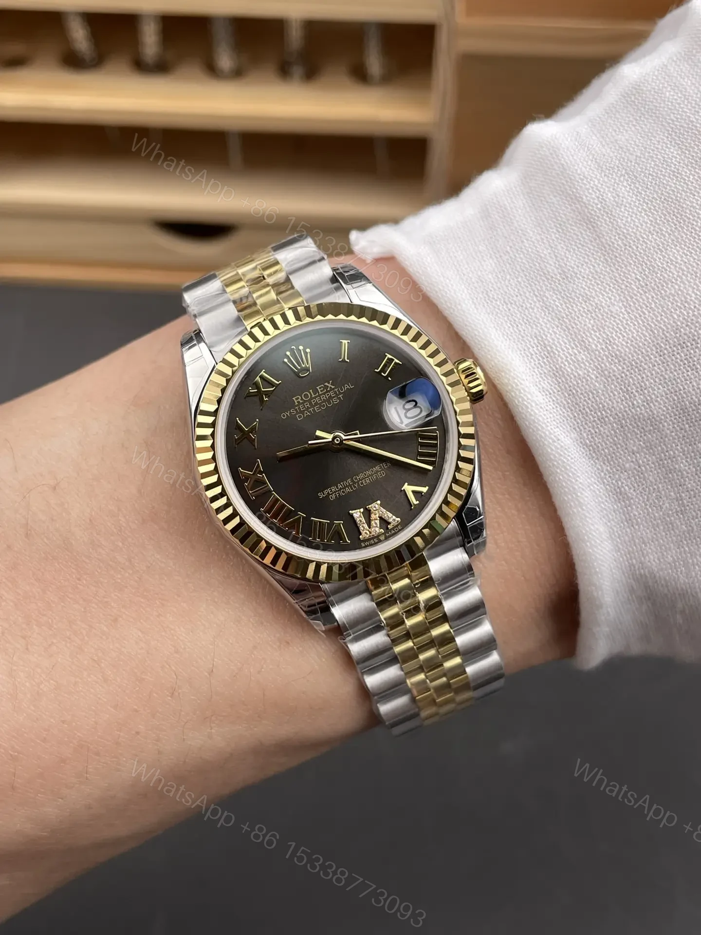 View 9 of Rolex Datejust 31 Stainless Steel Yellow Gold Fluted Grey – Roman Jubilee 278273-0018