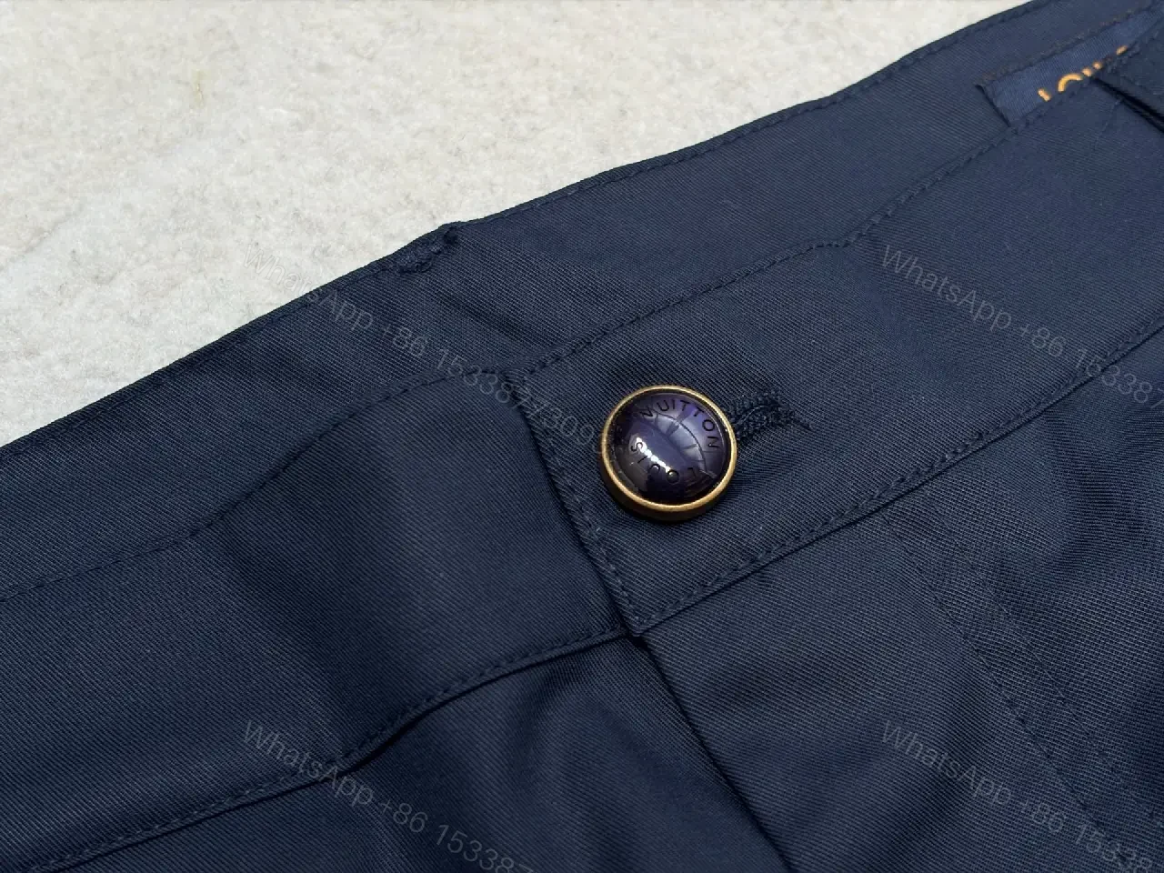 View 10 of Navy Cargo Shorts with Louis Vuitton Logo Embossed Key Features Short