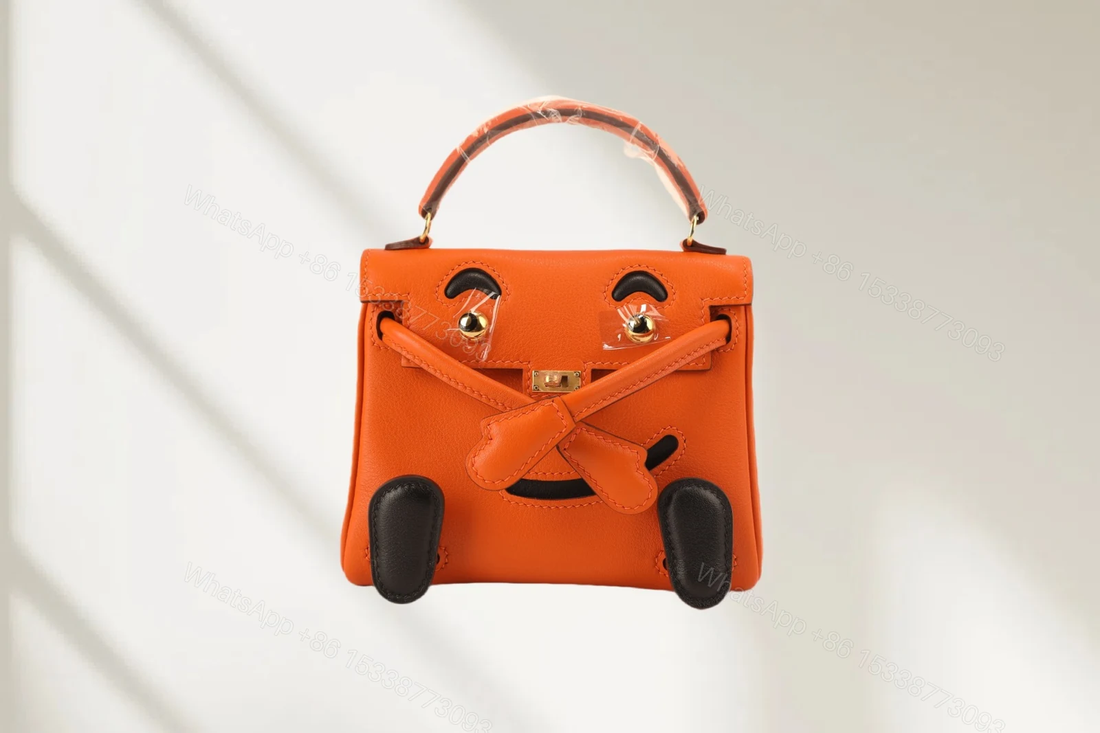 Hermes 原單 Kelly Doll 笑臉包 迷你手提包 橘色款 — view 1