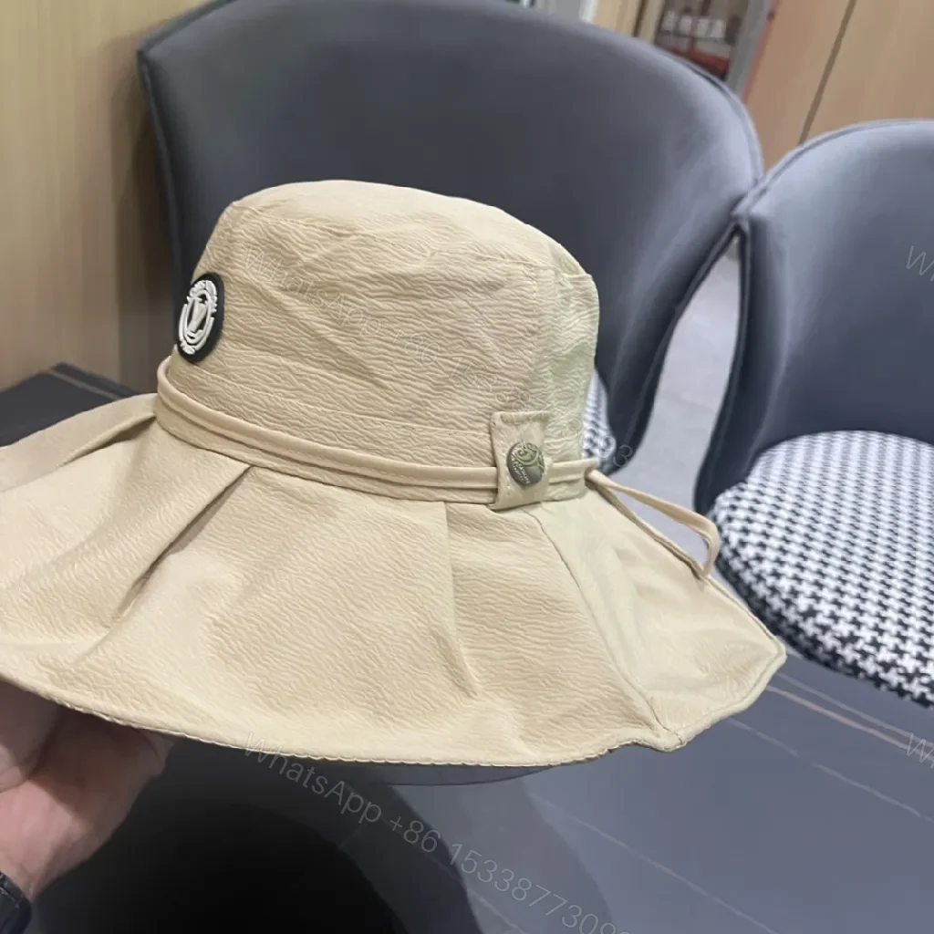 View 6 of Beige Textured Bucket Hat with Emblem, Everyday Luxury
