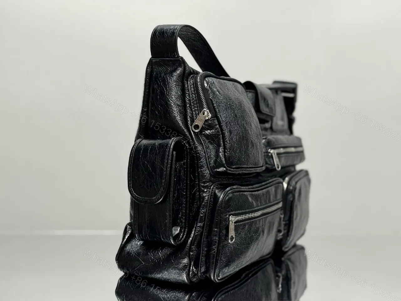 View 6 of Compact Black Leather Messenger Bag: Sleek Crossbody Utility
