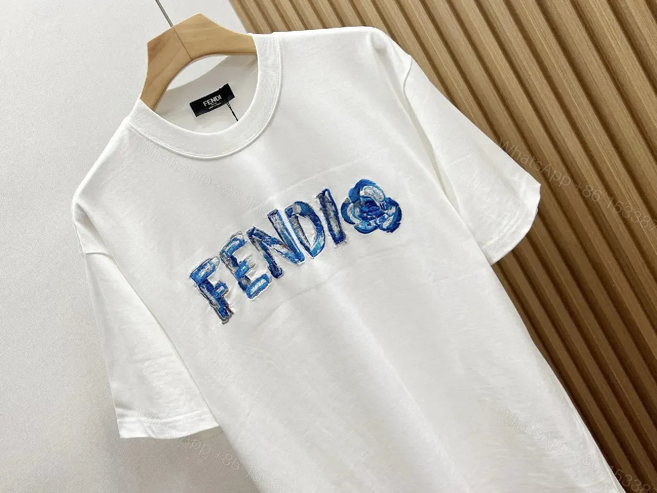 View 10 of Bold Graphic Texture Cotton Tee – Elevated Everyday Luxe