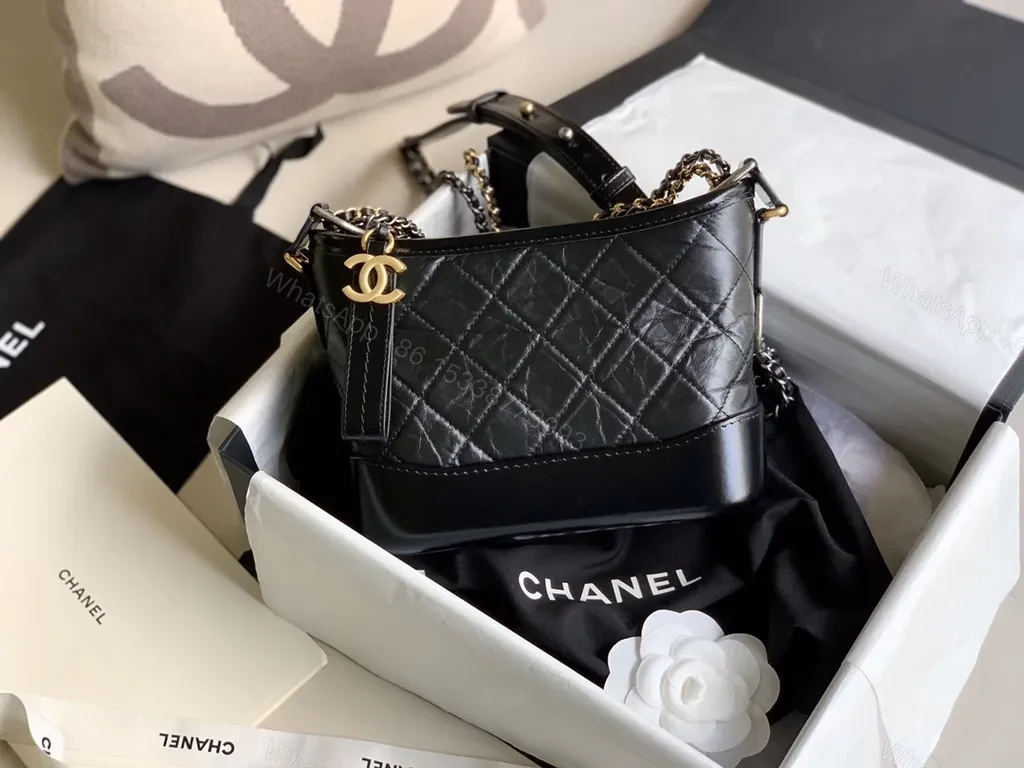 Chanel-Style Quilted Crossbody: Black Leather, Gold Charm — view 1