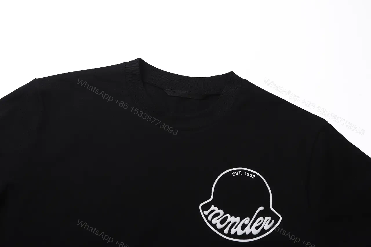 View 6 of Black Cotton Tee with Crest – Subtle Luxe Streetwear Top