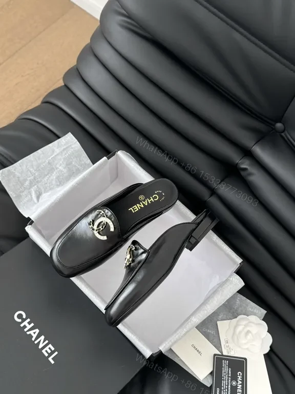 View 2 of Chanel-Inspired Black Leather Slip-Ons with Signature Hardware