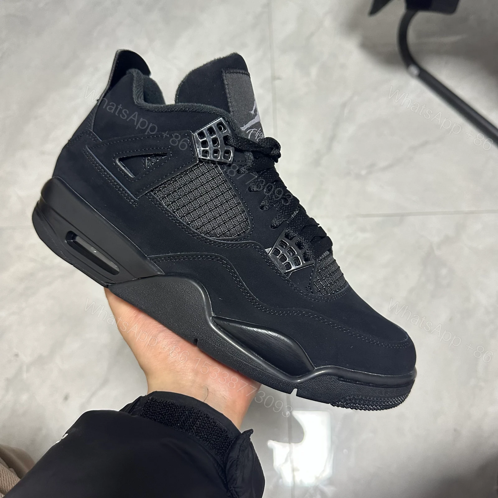 View 2 of Jordan 4 Retro Black Cat (2020)