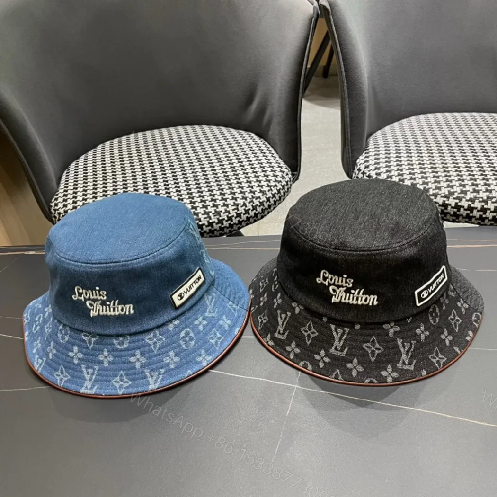 View 2 of Denim Bucket Hat with Monogram Detail – Sun Protection