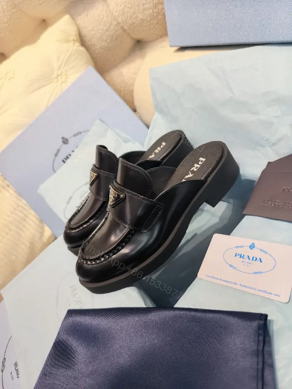 View 3 of Black Leather Prada Mules with Logo Detail Sliders, Women’s Fashion