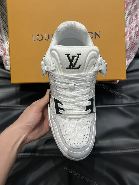 View 4 of White Leather High-Top Sneakers with LV Branding and Visible Hardware