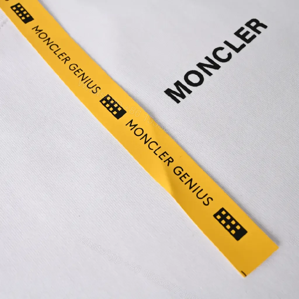 View 3 of Lightweight White Tee with Subtle Moncler Logo, Modern, Ultra-Comfortable